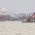 Crews return to the Potomac River to recover wreckage from DC midair collision