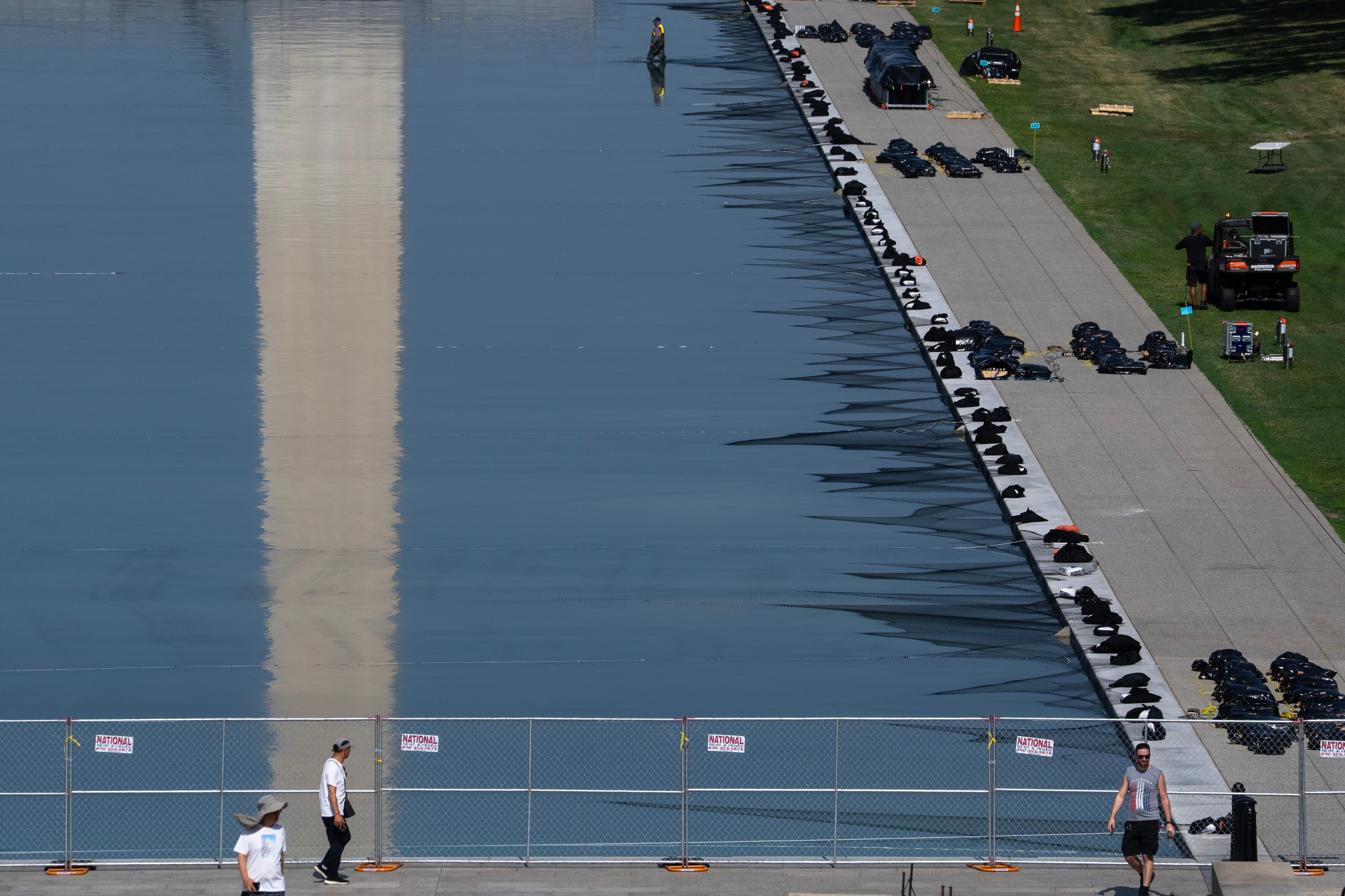 Algae protestors make fun of Trump's Reflecting Pool renovation