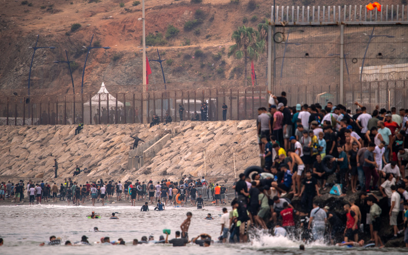 At least 18 die after thousands invade Spain from Morocco