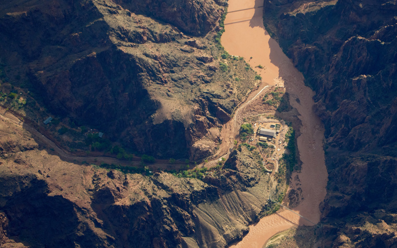 Rescuers saved some 80 people in Grand Canyon floods that left 2 dead and 1 missing