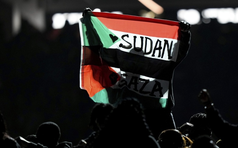 Super Bowl halftime performer detained after unfurling Sudanese-Palestinian flag