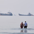 US strikes bridges and collapses a tower at a key Iranian port