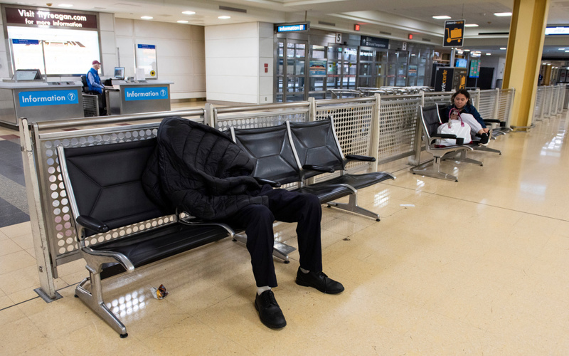 Some flight cancellations and delays continue after US storms dump snow