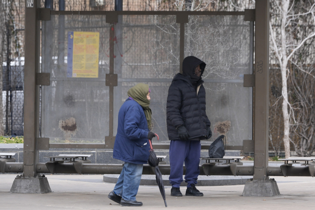 Winter-weary East Coast hit with another storm as temperatures plunge elsewhere