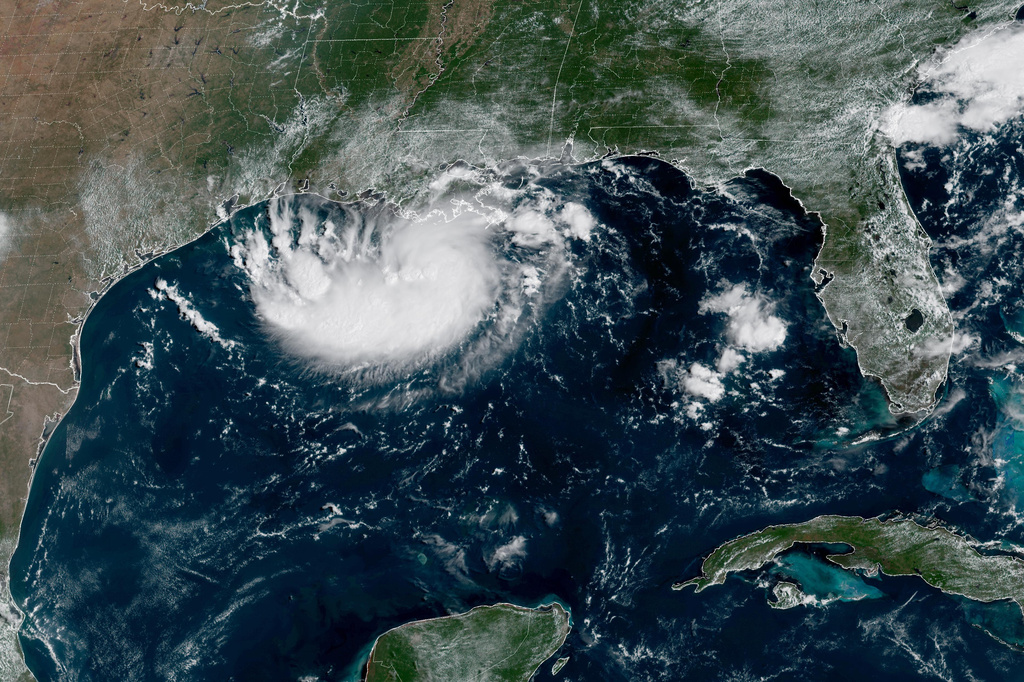 Louisiana and Texas warned of tropical storm as Hawaii braces for potential hurricane
