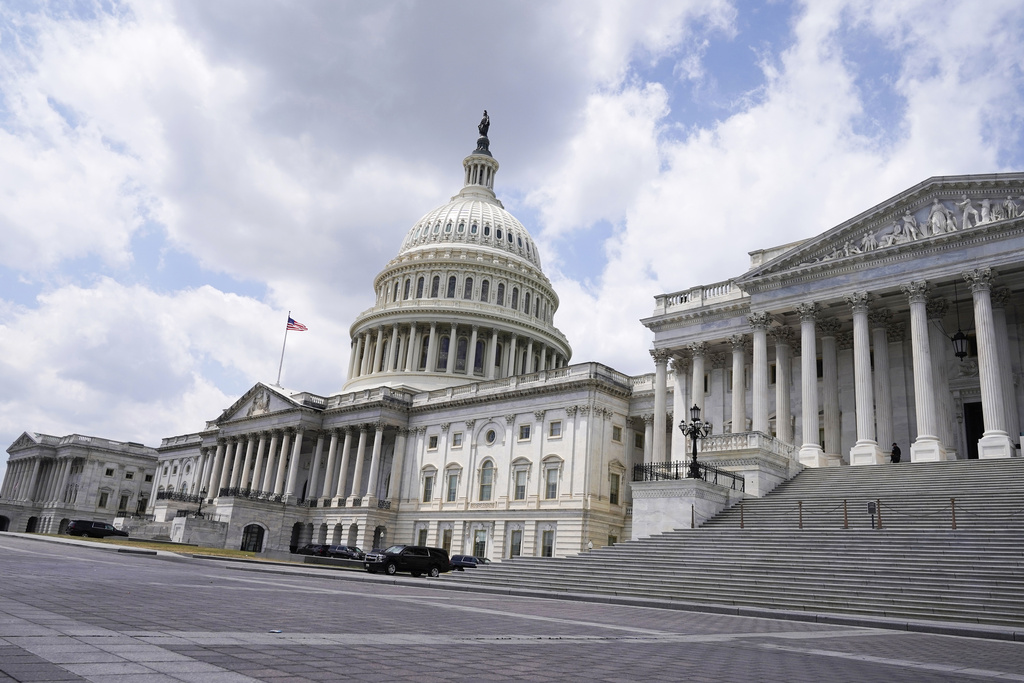 GOP conservatives pressuring Johnson as House, Senate react to spending plan