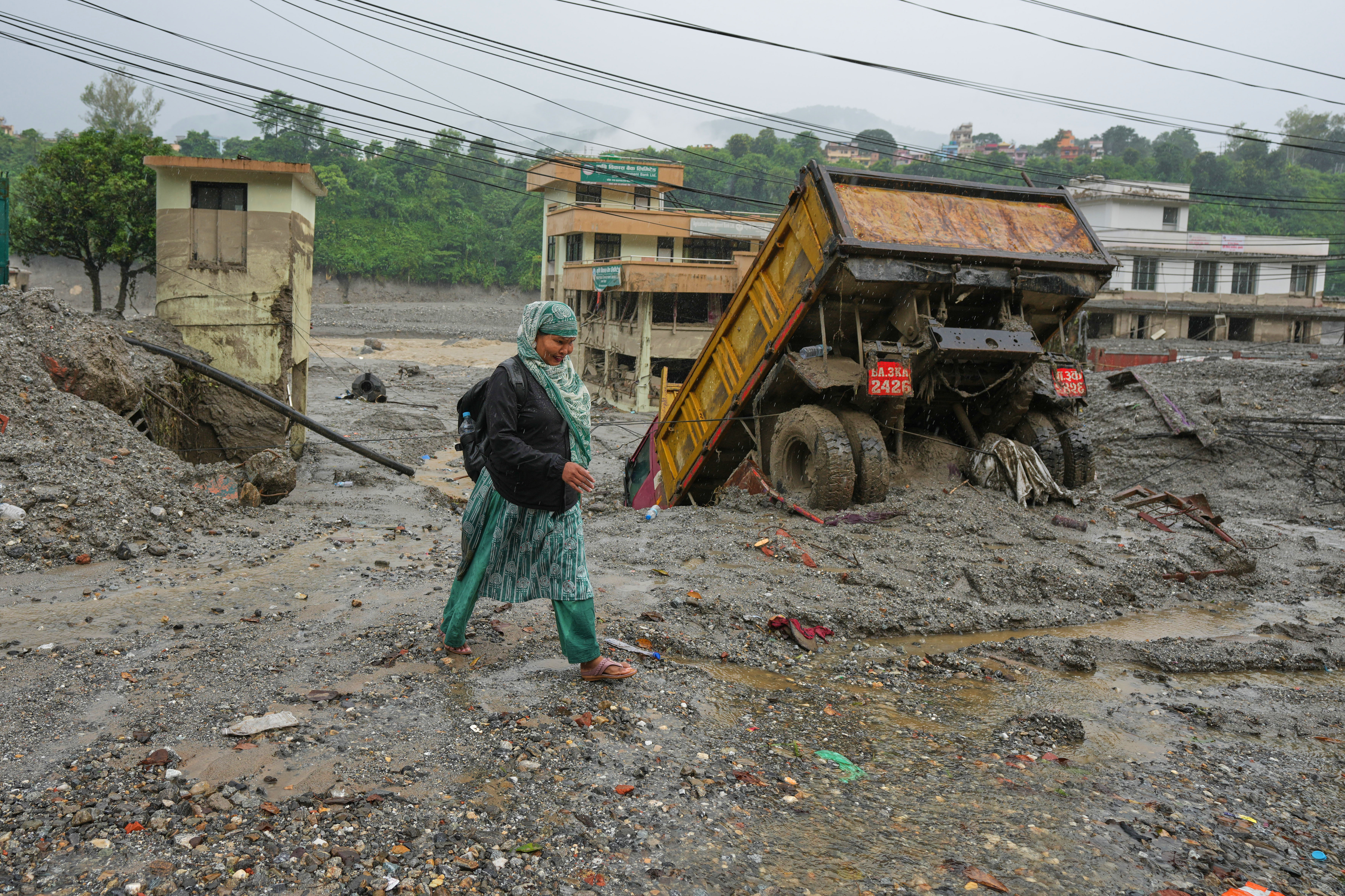 Nepal-China flood survivors reach safe areas as families await news of nearly 3,000 missing