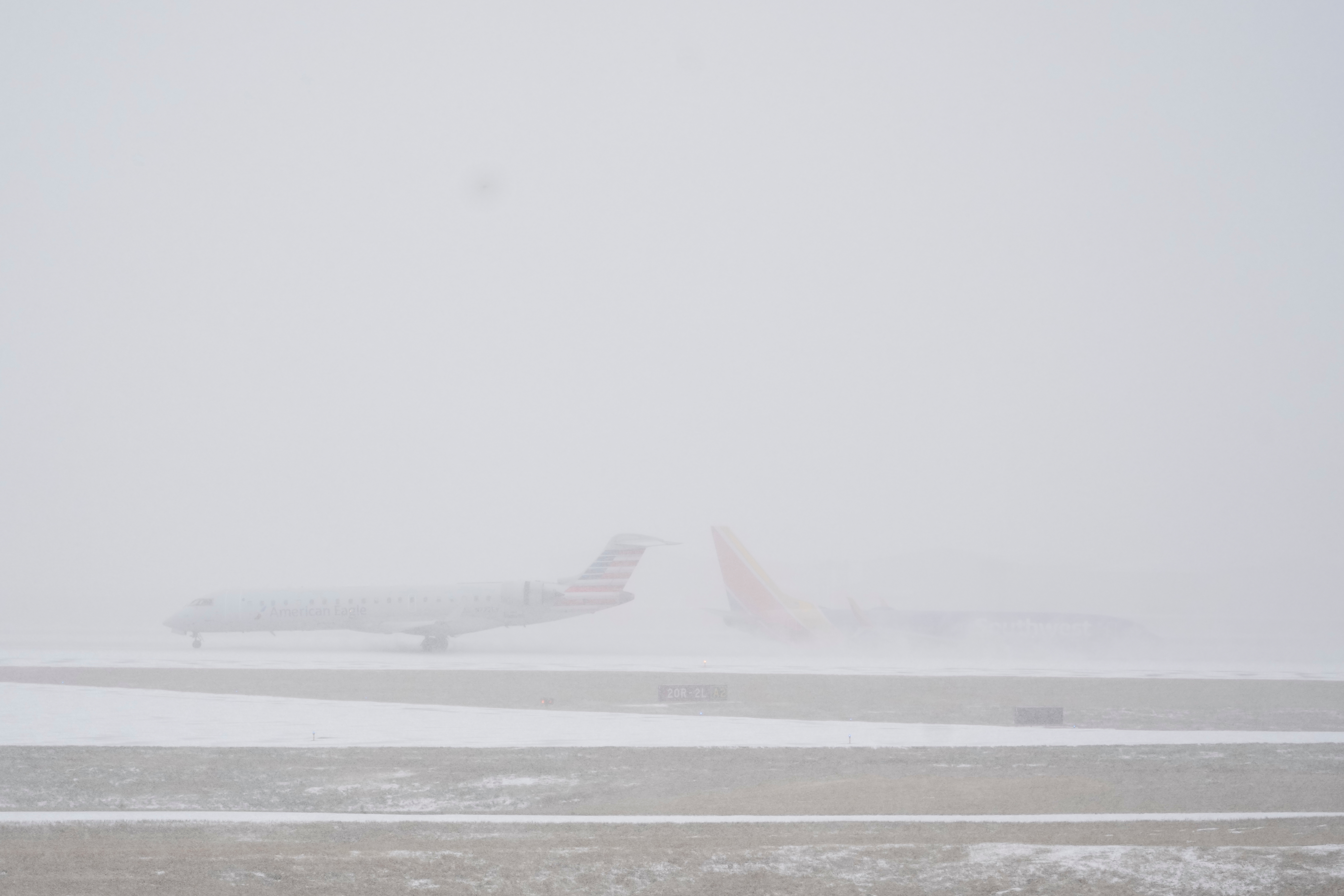 US airlines and airports brace for a brutal travel day amid massive winter storm