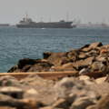 Stranded ships have begun transiting the Strait of Hormuz