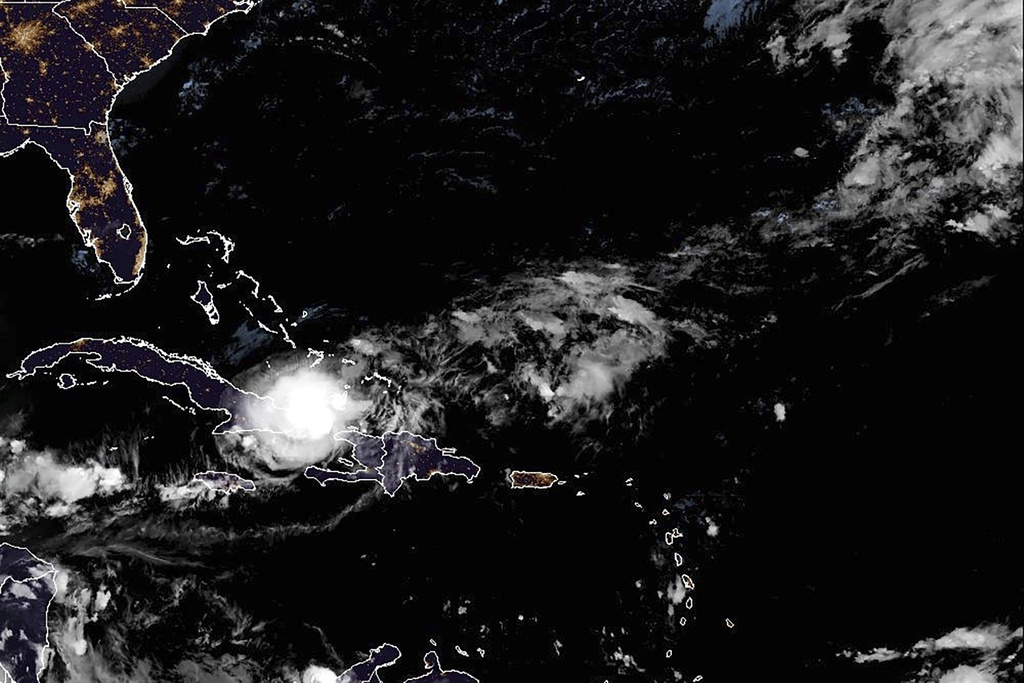 Tropical Storm Oscar swirls toward Bahamas after hitting Cuba as a hurricane