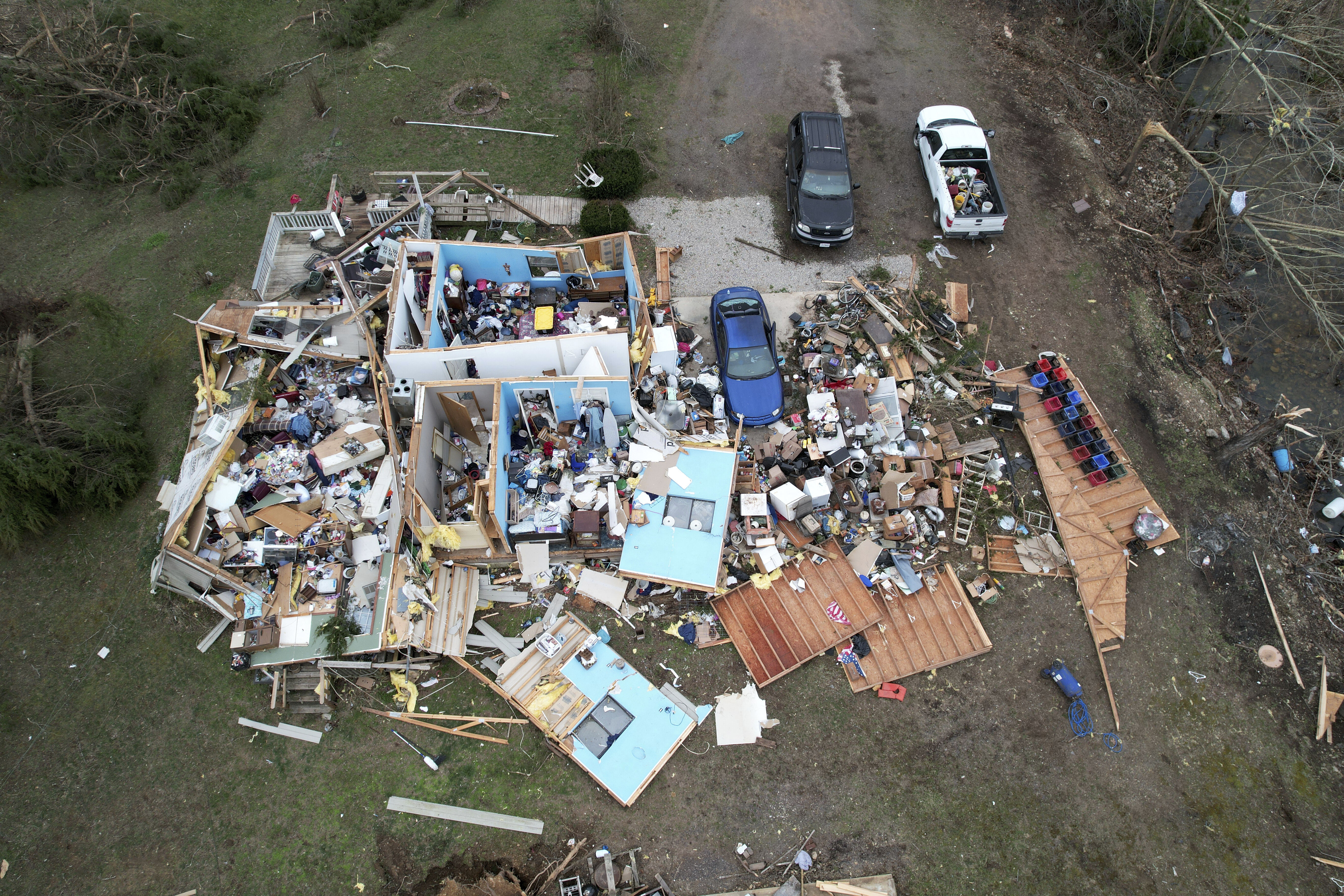 Tornadoes, wildfires and blinding dust sweep across US as massive storm leaves at least 32 dead