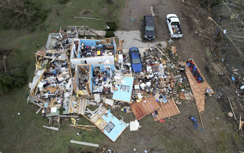 Tornadoes, wildfires and blinding dust sweep across US as massive storm leaves at least 32 dead