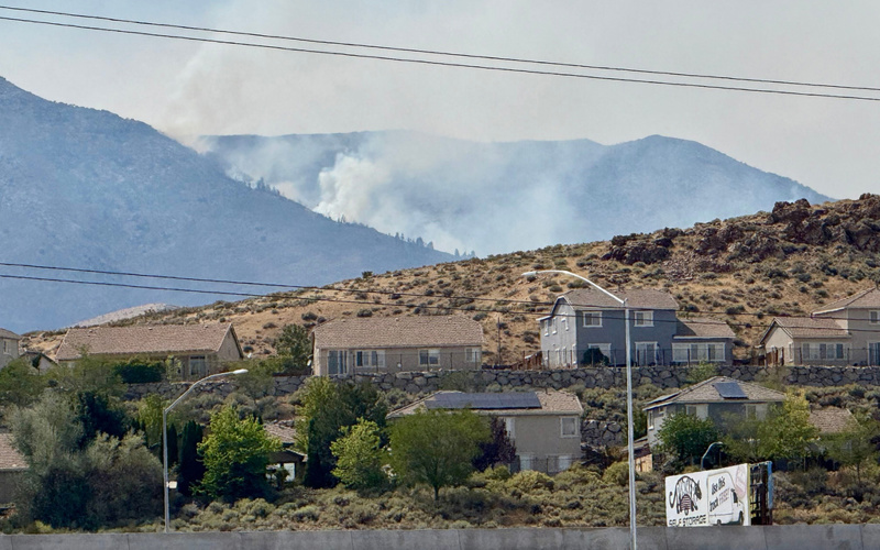 Thousands evacuated as fast-moving wildfire threatens Reno, Nevada