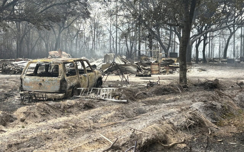 Southern US wildfires force residents to flee, leaving them unsure about fate of houses