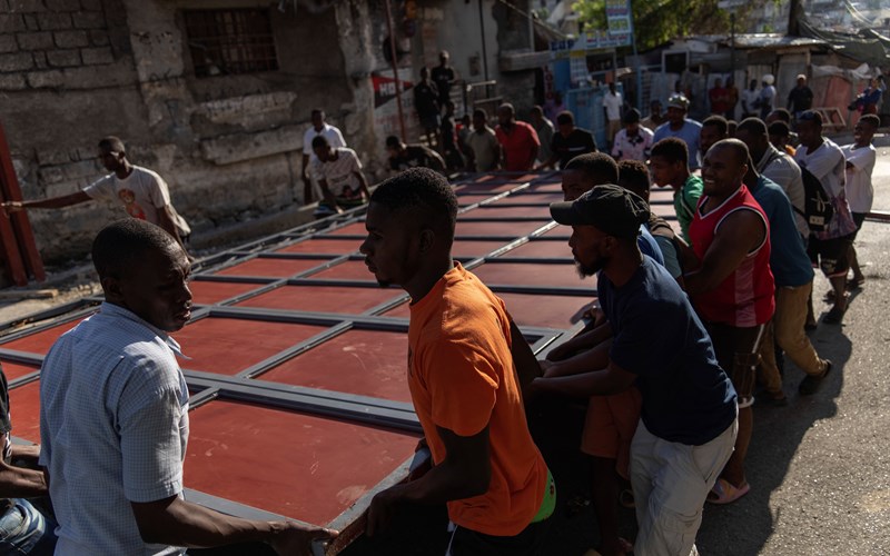 Haitians scramble to survive, seeking food, water and safety as gang violence chokes the capital