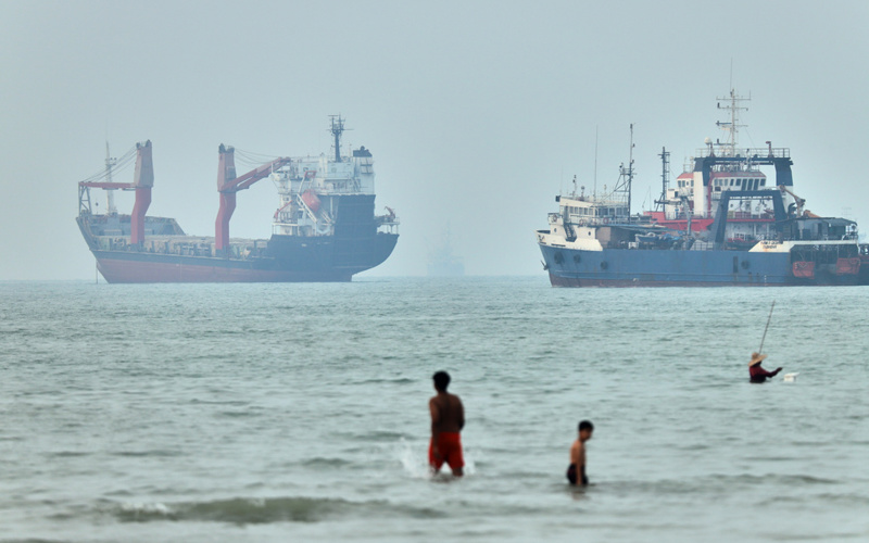 Cargo ship reports being struck in Strait of Hormuz