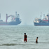 Cargo ship reports being struck in Strait of Hormuz 