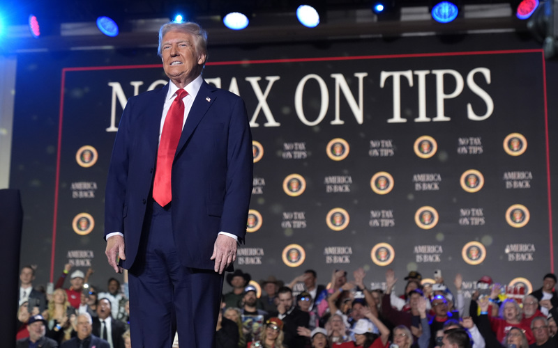 Trump leans into his pledge to eliminate taxes on tips at a Las Vegas rally