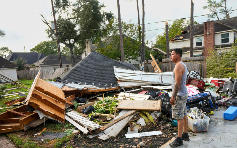Torn roofs and smashed windows among damage to over 100 homes in a tornado near Houston