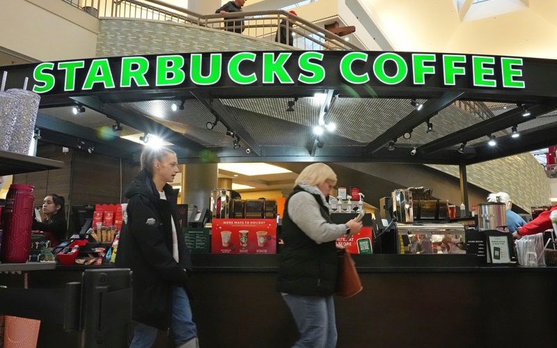 Starbucks to close hundreds of stores, lay off 900 workers