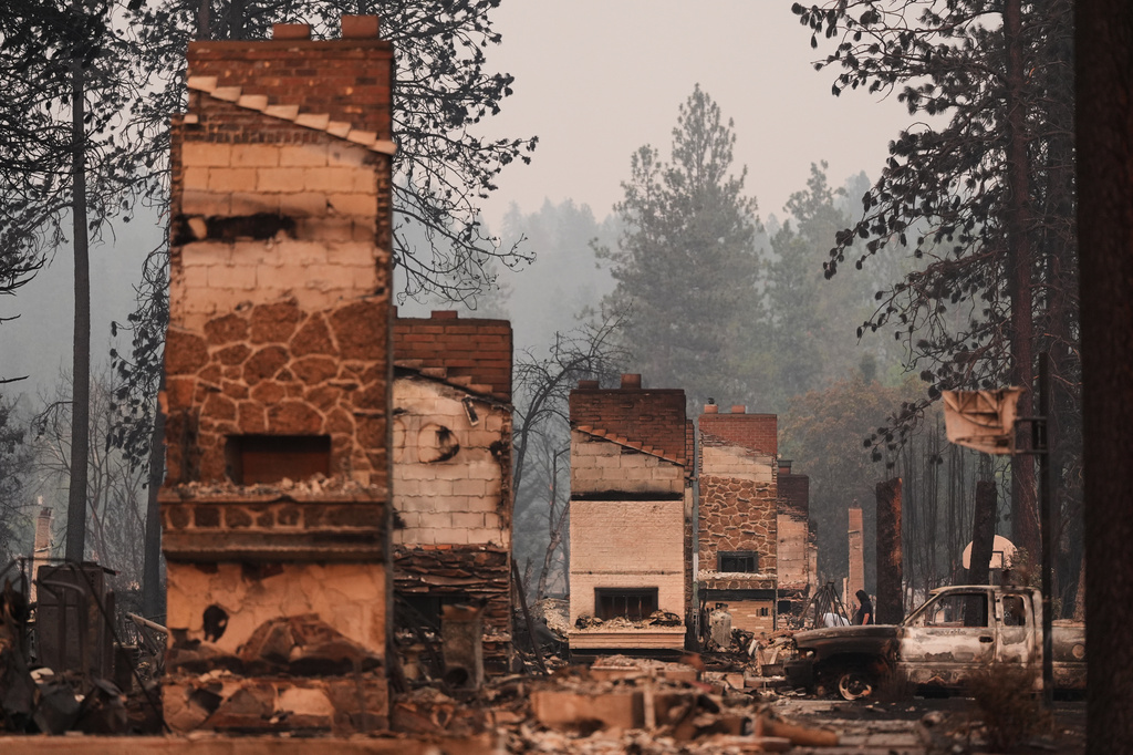 Man charged with setting Spokane's largest wildfire went to prison for killing his father