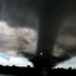 Tornado barrels through Oklahoma, damaging homes and shutting down roads
