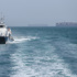 US denies Iran struck a military vessel during new effort to reopen Strait of Hormuz