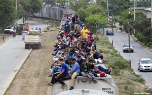 Illegals on top of train
