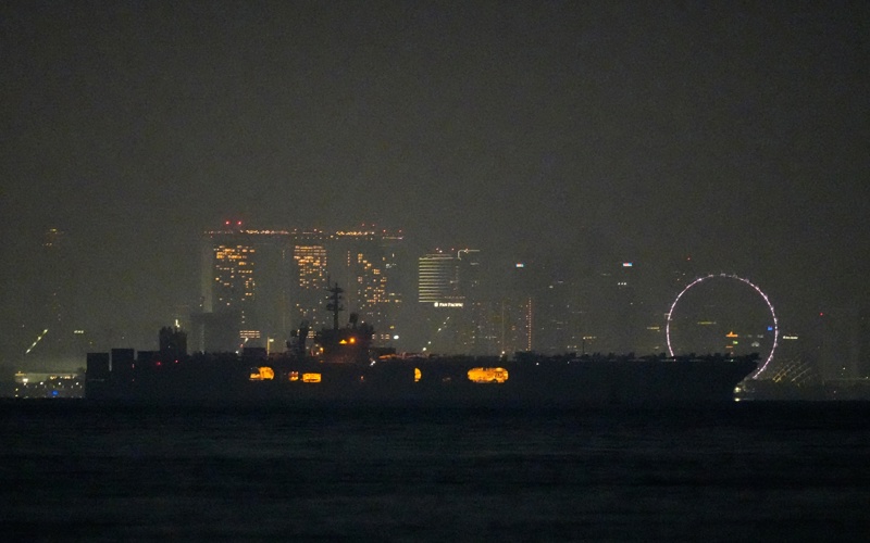 USS Abraham Lincoln sails past Singapore on its way home from Middle East