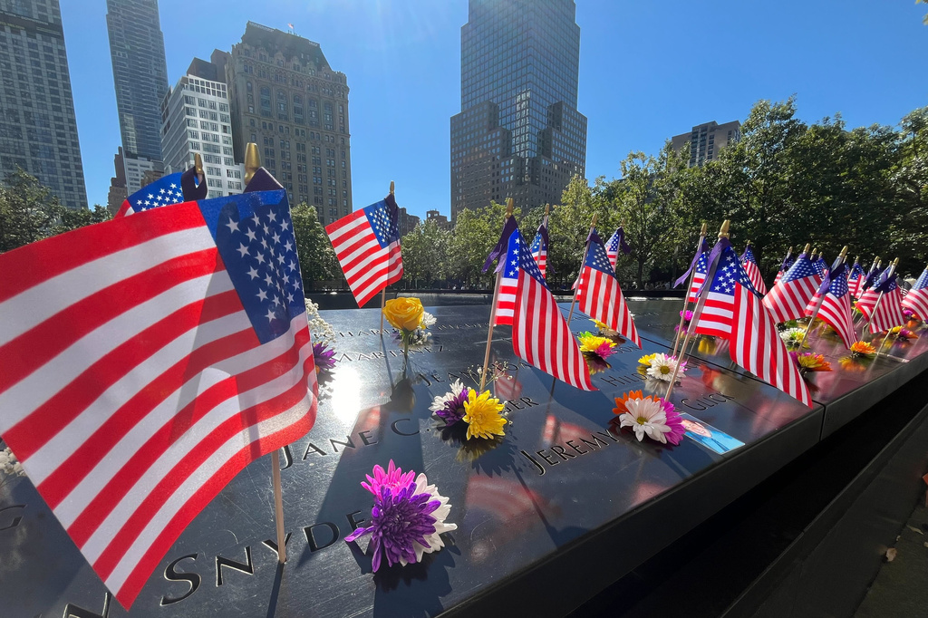 US commemorates 9/11 attacks with victims in focus, but politics in view