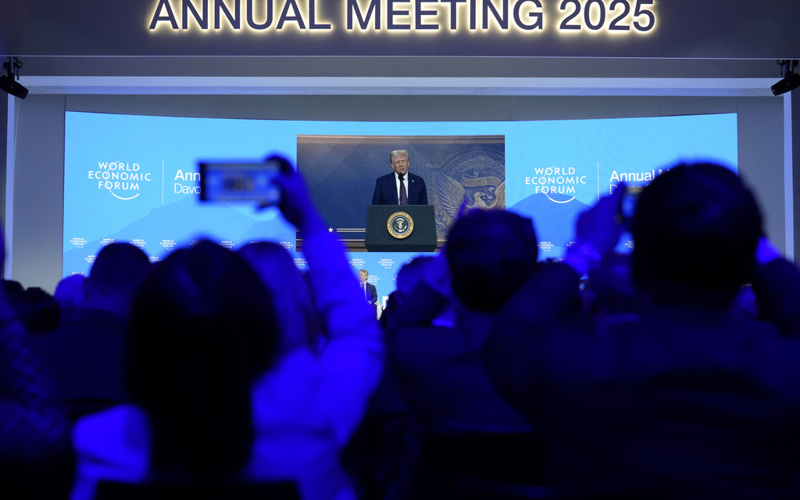 Trump tells Davos elite to invest in US or face tariffs