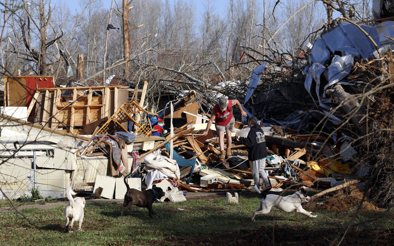 Tornadoes, wildfires and blinding dust sweep across US as massive storm leaves at least 37 dead