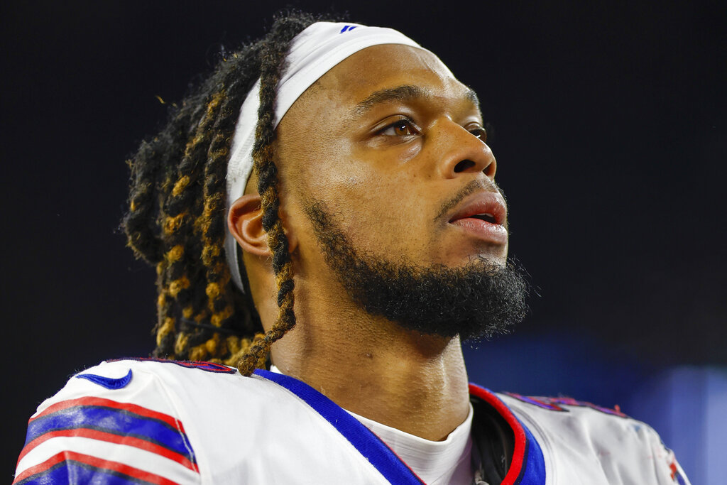 Agent: Bills safety Damar Hamlin is breathing on his own