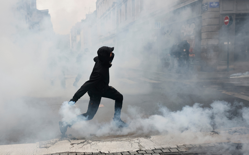 More than 400,000 protest across France, challenging Macron as Paris clashes erupt
