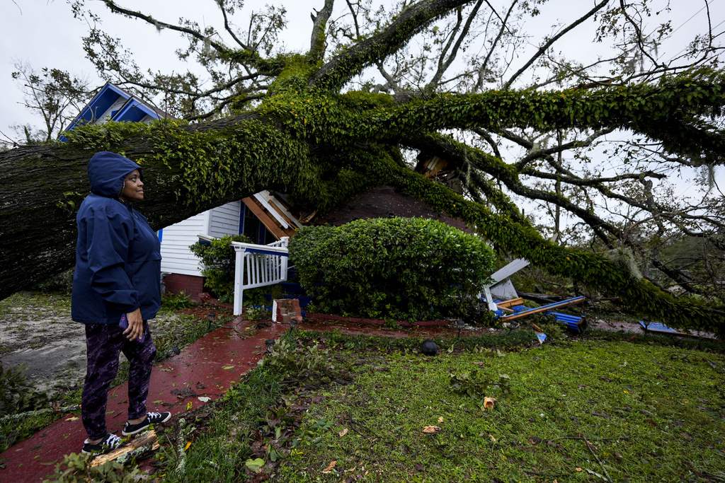 Helene claims at least 3 lives as it weakens to a tropical storm